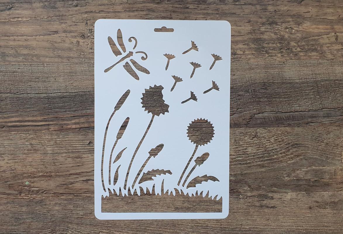 Schablone mit Löwenzahn und Schmetterlingen